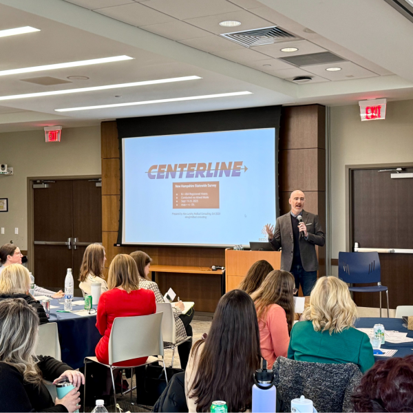 Alex Lundry presenting the New Hampshire poll findings at a childcare solutions forum at St. Anselm College.